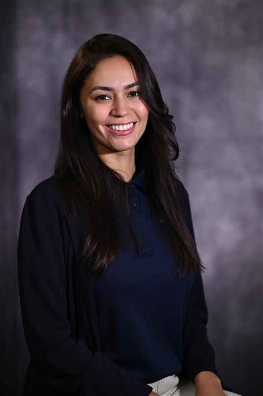 Pretty woman smiling at the camera.